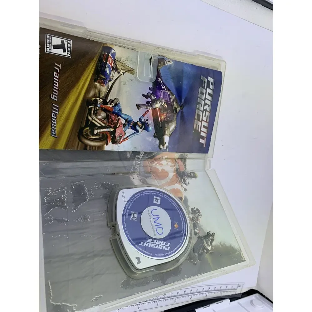PURSUIT FORCE SONY PSP Tested Fast Shipping Water Damage To Jacket